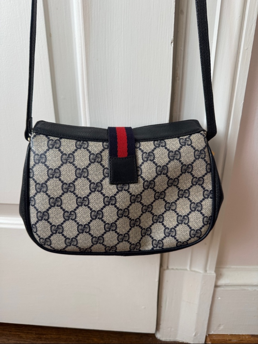 Gucci Beige Navy Crossbody with Black Trim and Red Accent
9”x 6” x 2 1/2” - Picture 2 of 6